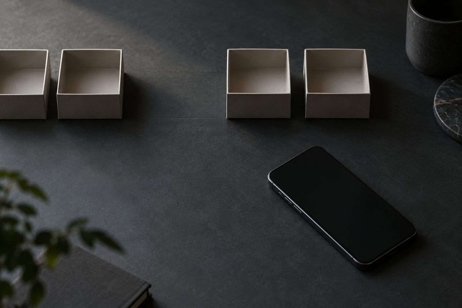 Unbranded phone and empty display boxes illustrating a restock alert