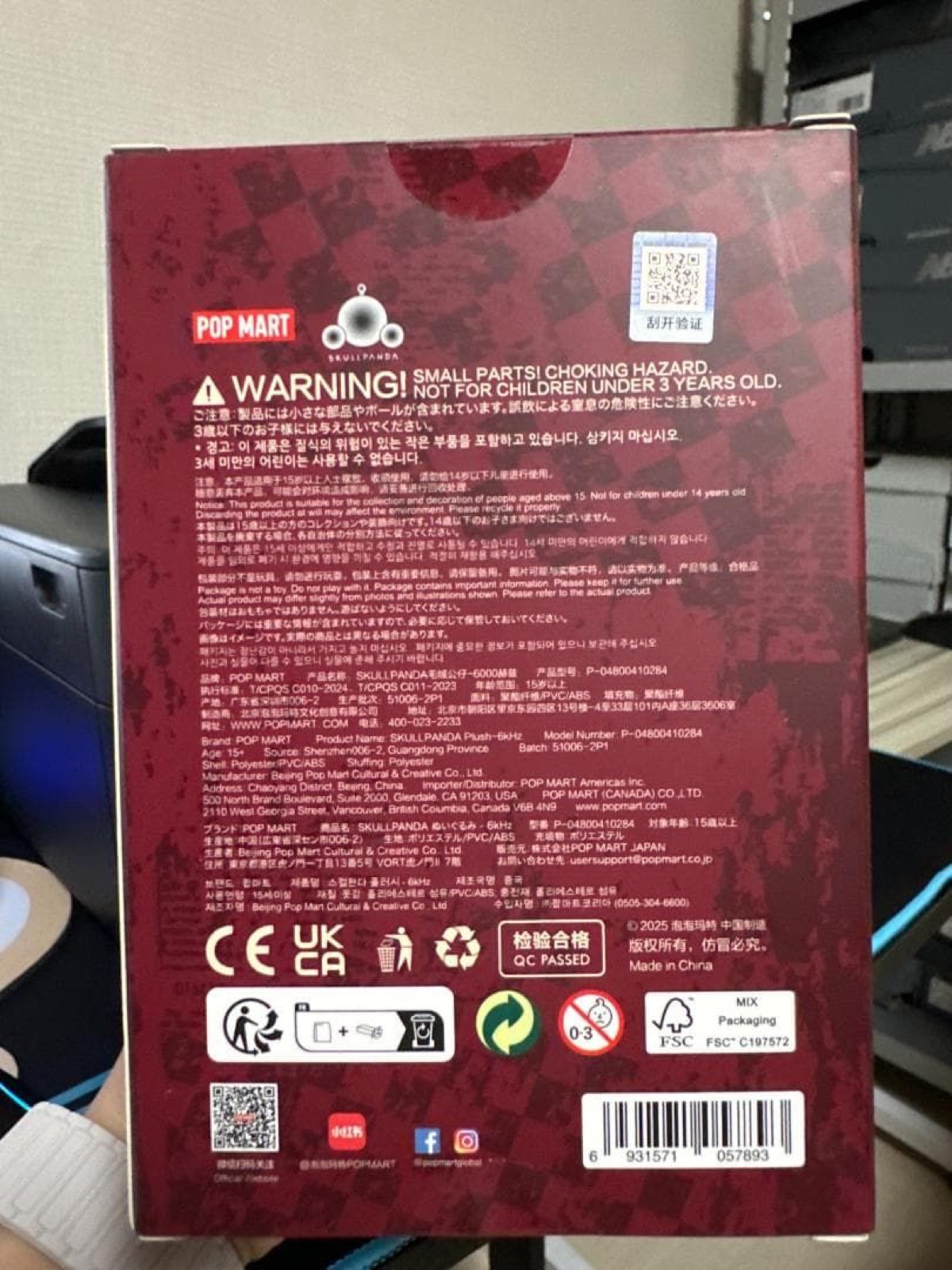 Back of the SKULLPANDA 6kHz box with warnings, multilingual product information and a barcode (unedited photo)
