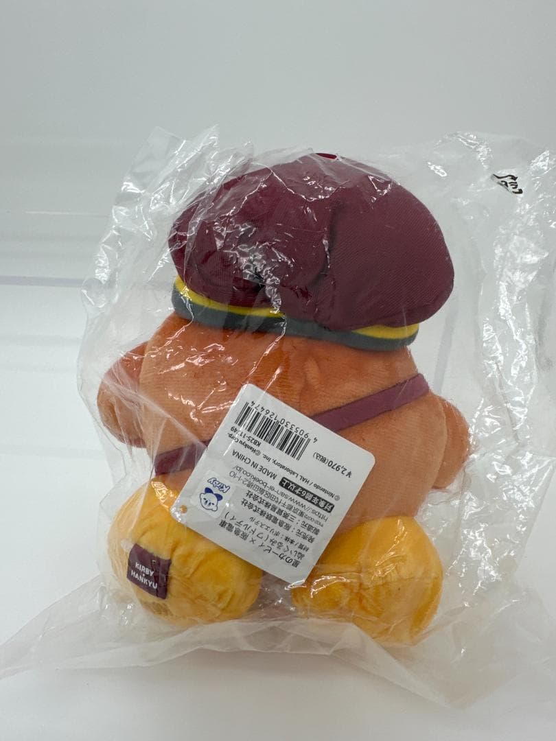 Unedited rear listing photo of the Waddle Dee plush with paper tag and pouch strap
